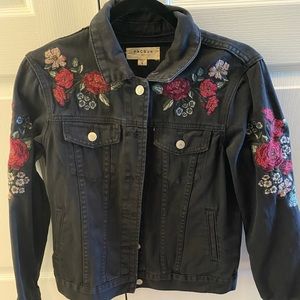 Black denim jacket with floral detail